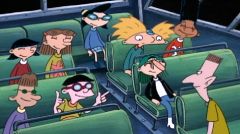 Arnold on the bus with classmates in Hey Arnold