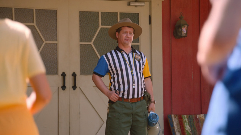 Dewey standing outside the barn