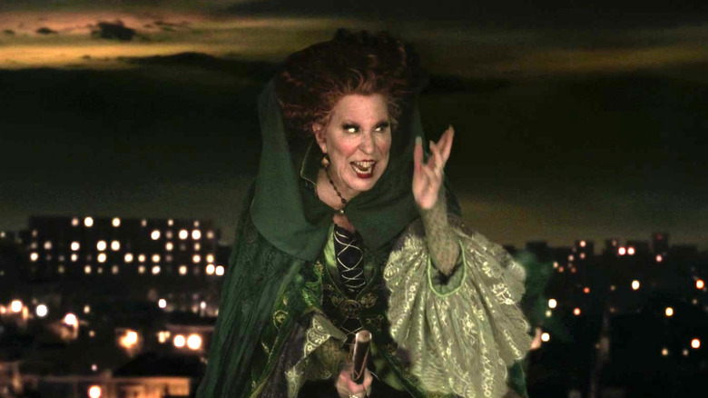 Bette Midler flying