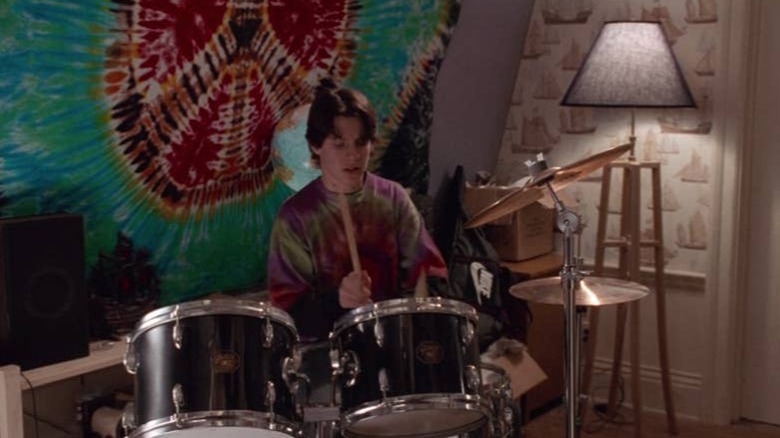 Max Dennison plays the drums