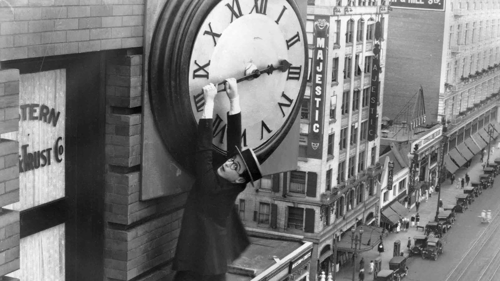 Harold Lloyd hanging from clock