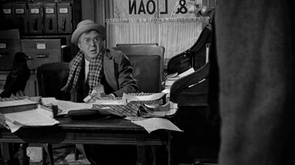 Thomas Mitchell as Uncle Billy with his raven in It's a Wonderful Life