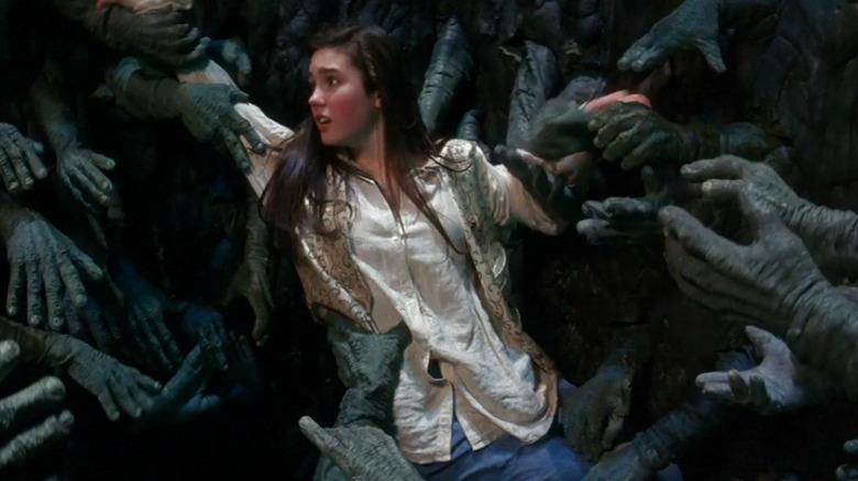 Sarah being held by the helping hands in Labyrinth