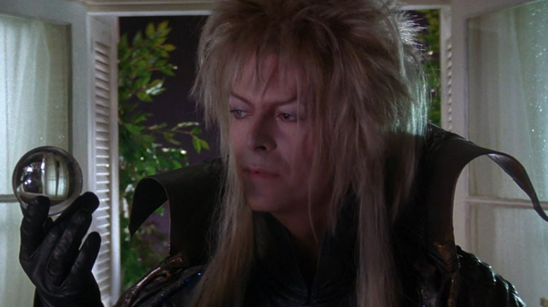 David Bowie as Jareth with big hair and loud makeup in Labyrinth