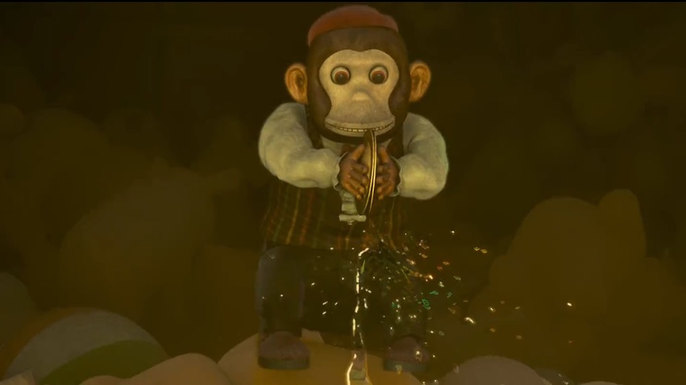 The monkey doll crashes his cymbals together in Monster House