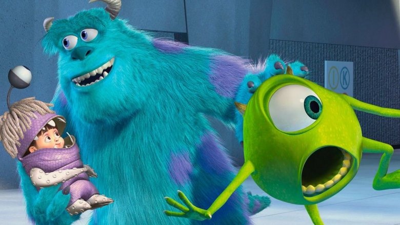 Mike and Sulley with a disguised Boo in Monsters, Inc.