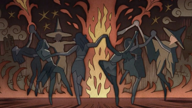 Witches dancing around fire