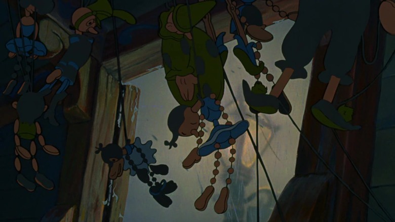 Stromboli's puppets dangling from the ceiling