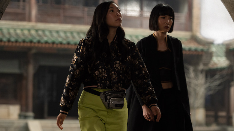 Awkwafina and Meng'er Zhang walk "Shang-Chi and the Legend of the Ten Rings"