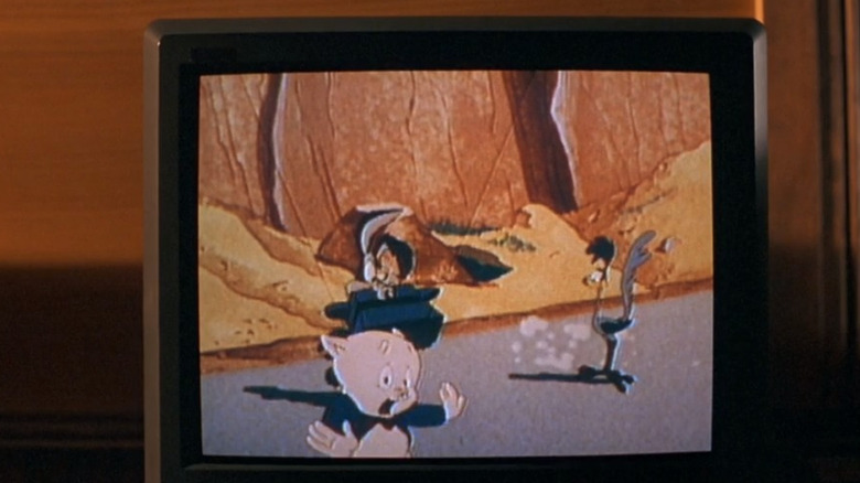 Porky Pig interrupting Roadrunner