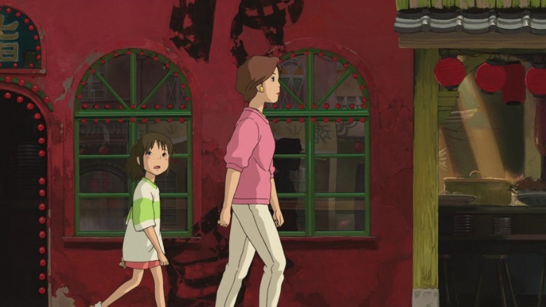 Chihiro walking through ghost town