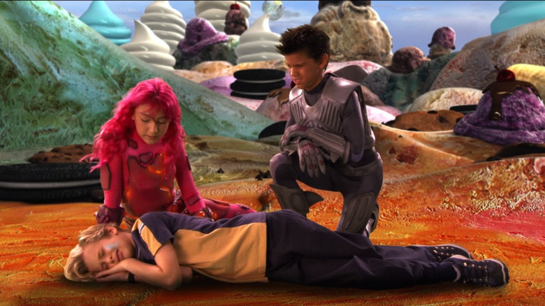 Lavagirl and Sharkboy watch over a sleeping Max