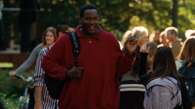 Michael high fives another student