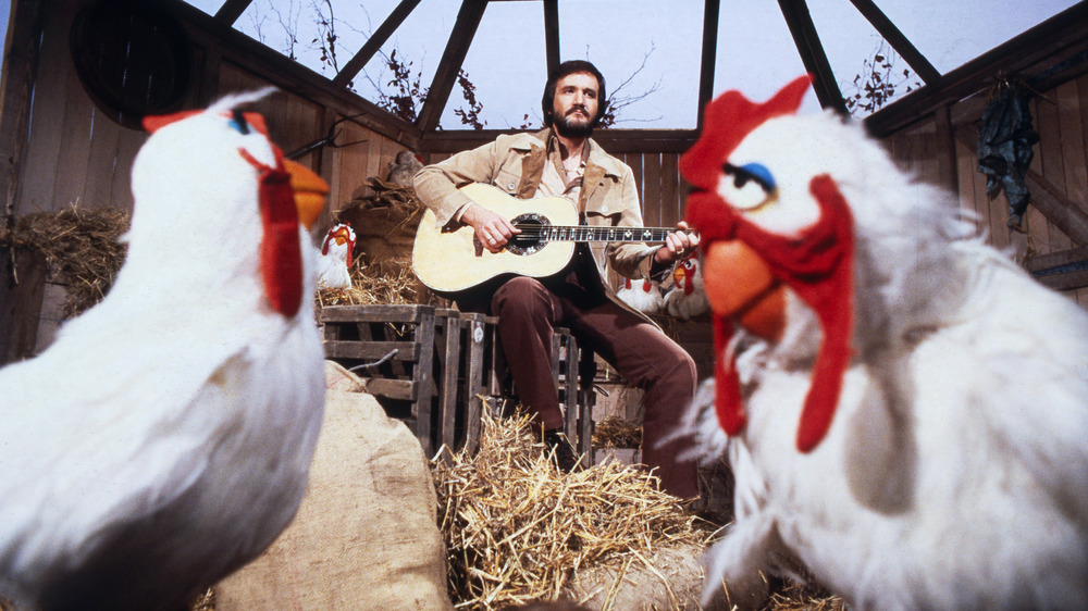 Roger Miller plays guitar