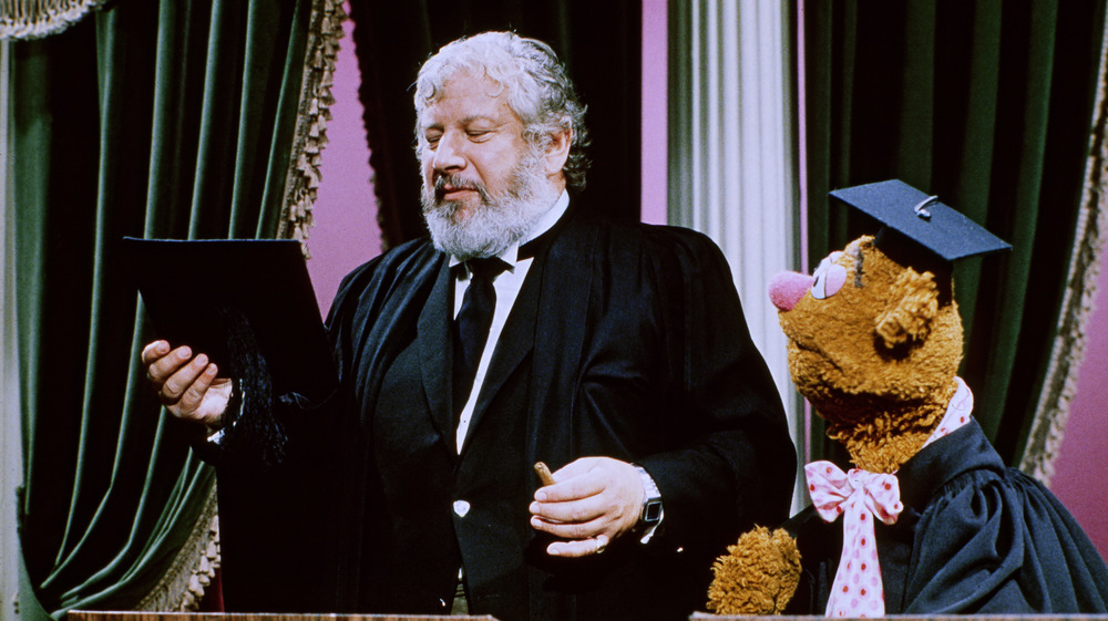 Peter Ustinov and Fozzie Bear in academic robes