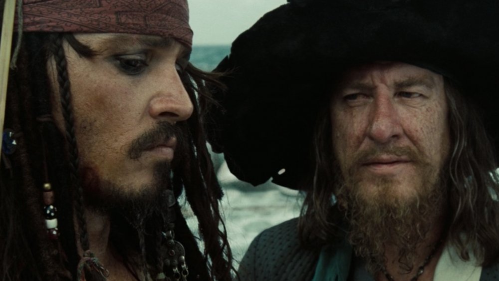 Johnny Depp and Geoffrey Rush as Jack Sparrow and Captain Barbossa