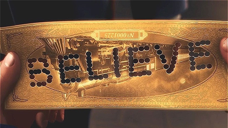 A golden ticket that reads "Believe"