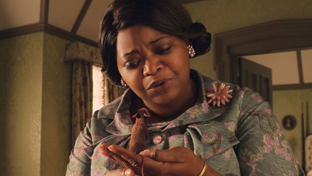 Octavia Spencer as Grandma holding Bruno the mouse in The Witches