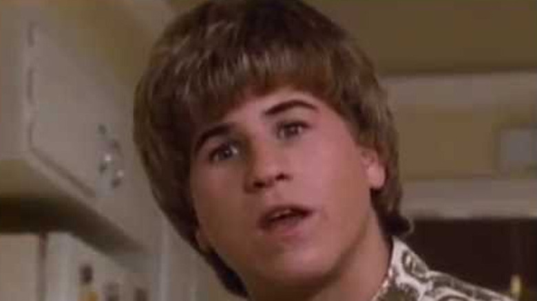 Jason Hervey with bowl cut in kitchen