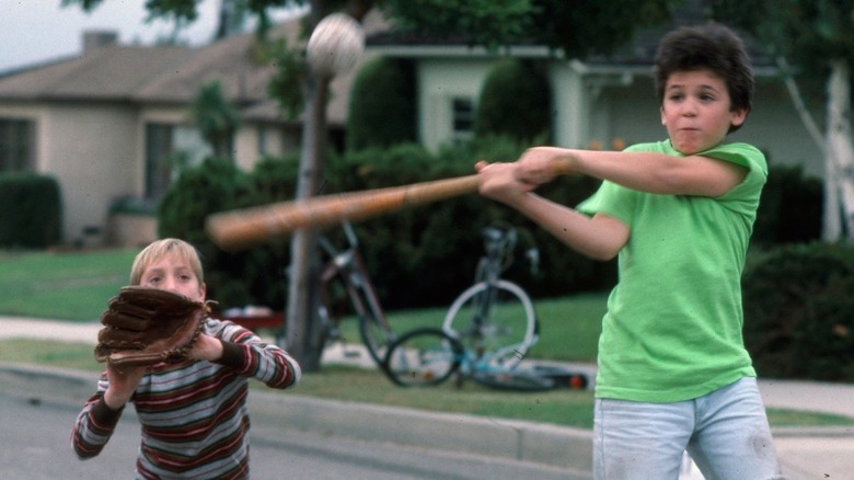 Kevin Arnold plays baseball in street