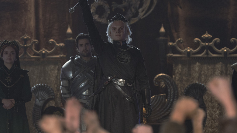 King Aegon raises his sword