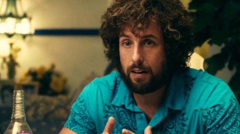 Zohan sitting at a table