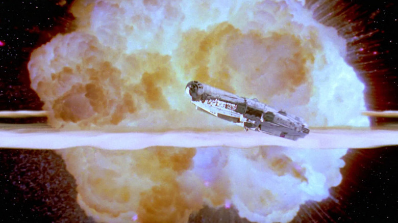 The Millennium Falcon in front of explosion