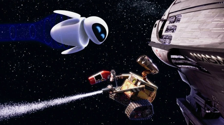 Eve and WALL-E fly with a fire extinguisher