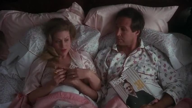 Chevy Chase and Beverly D'Angelo in bed in Christmas Vacation