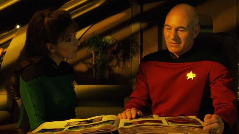 Picard looking at photos