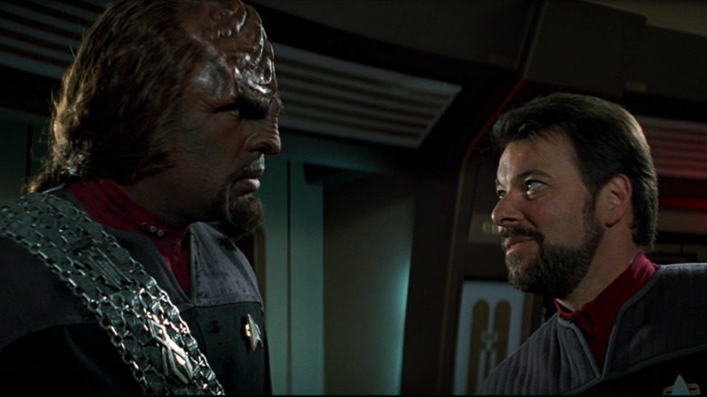 Riker joking with Worf