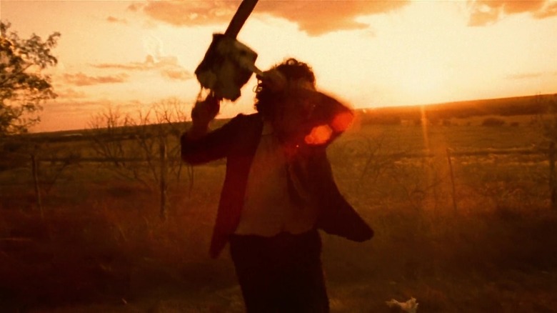 Leatherface brandishes chainsaw