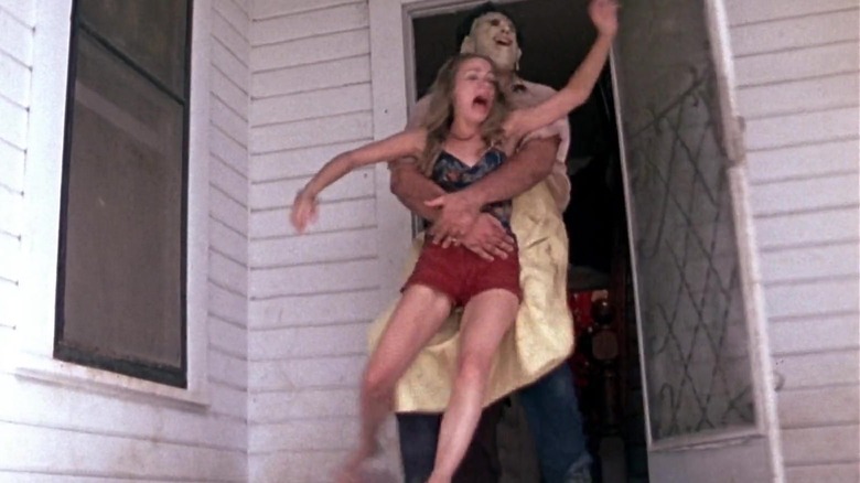 Leatherface drags Pam back into house