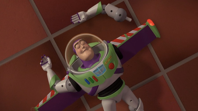 Buzz Lightyear lying on the ground