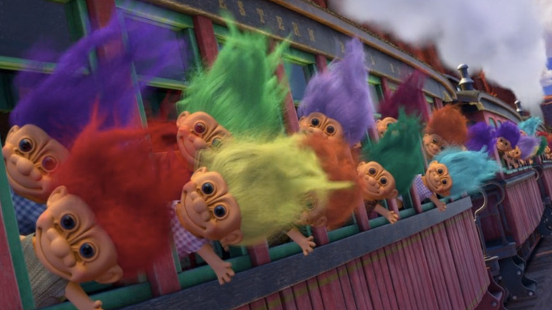 Troll dolls riding in train