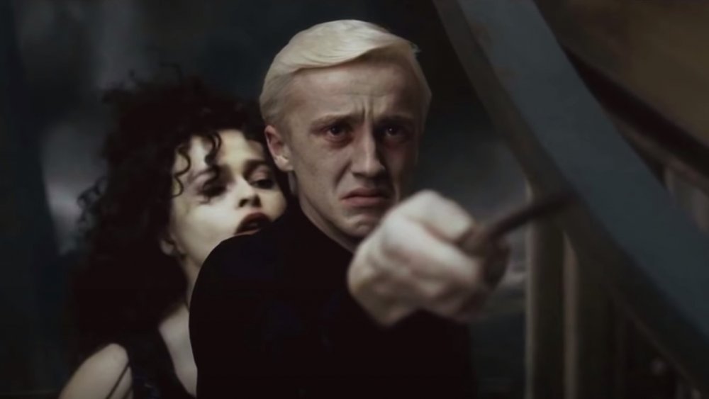 Helena Bonham-Carter as Bellatrix Lestrange, egging on Tom Felton as Draco Malfoy in Harry Potter and the Half-Blood Prince