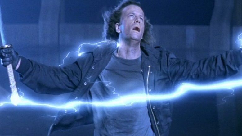 Electrified Connor MacLeod looking up