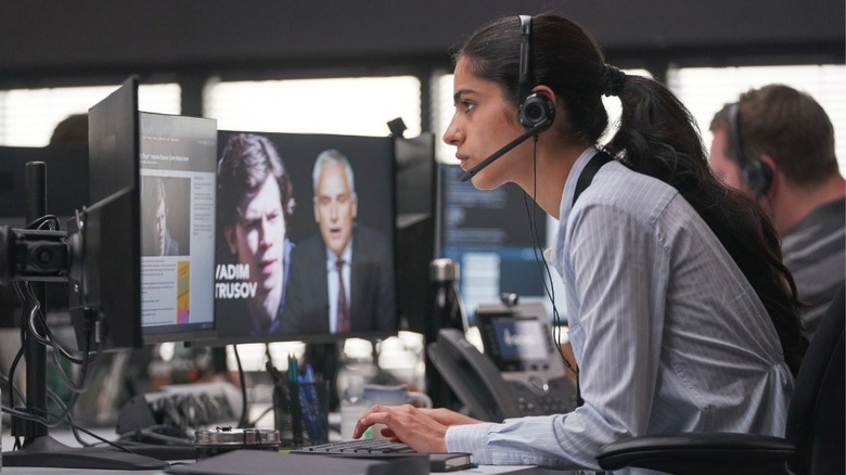 Saara wearing headset at desk