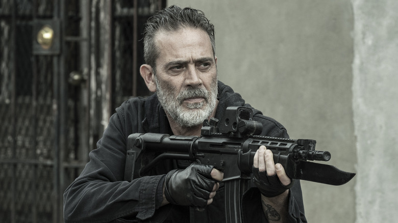 Negan holding gun