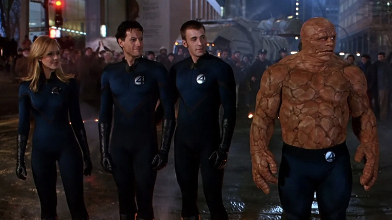 The Fantastic Four stand in street