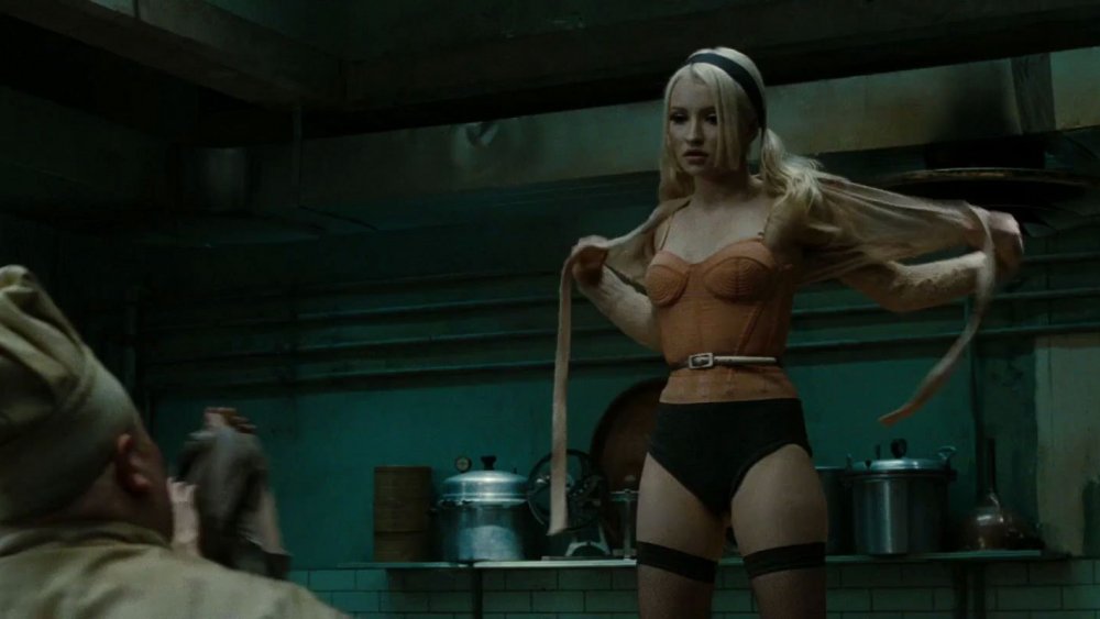 Malcolm Scott as The Cook and Emily Browning as Babydoll in "Sucker Punch"