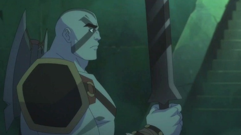 Grog holding sword