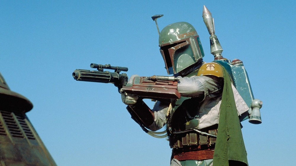 Boba Fett of Star Wars fame, aiming his weapon