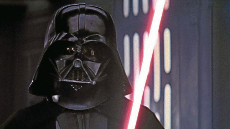 Darth Vader wielding a light saber in Star Wars A New Hope