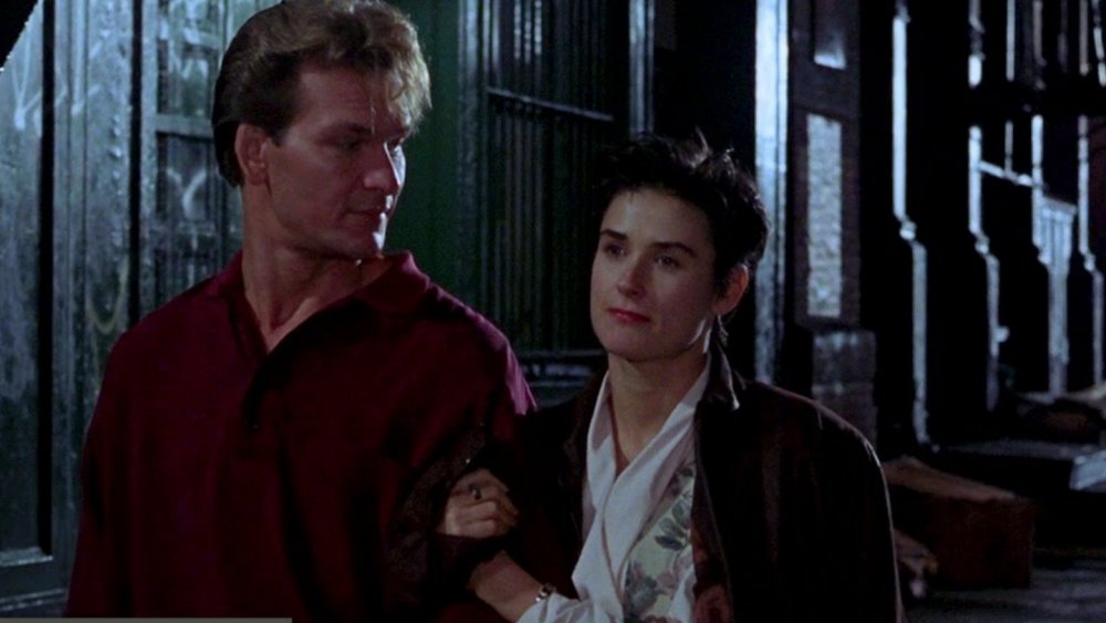 Patrick Swayze as Sam and Demi Moore as Molly walk home in Ghost