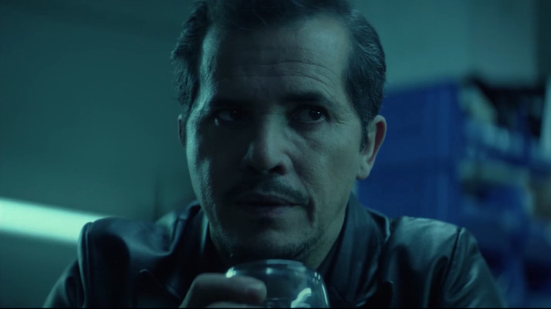 John Leguizamo with drinking glass