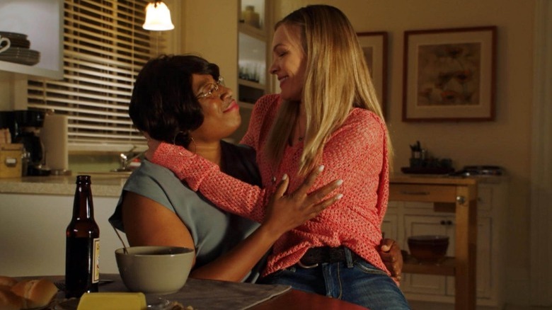 Aisha Hinds and Abby Brammell embrace in 9-1-1