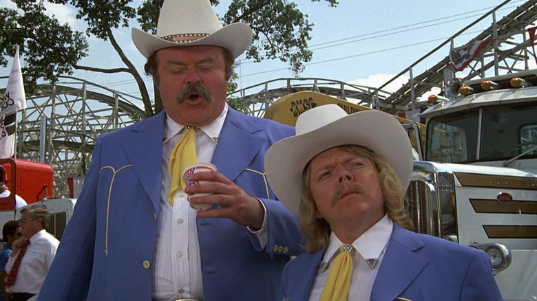 Big and Little Enos with trucks