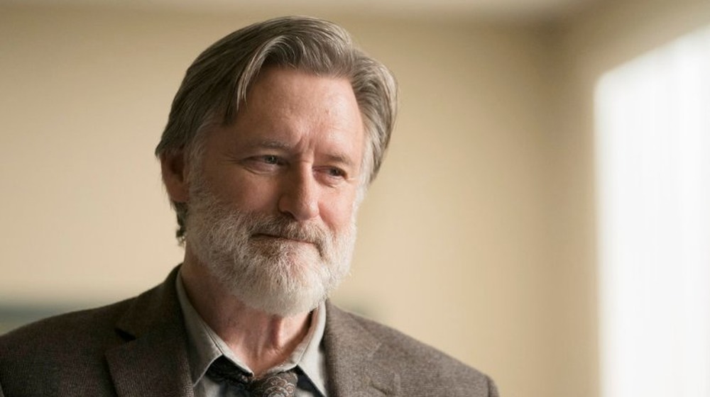 Bill Pullman slightly smiling