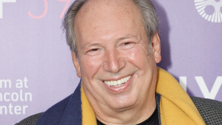 Hans Zimmer smiling while being photographed